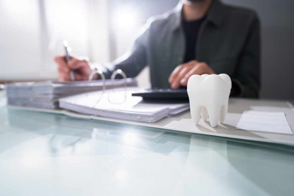 Dental practice financial records highlighting DSO embezzlement risk and fraud prevention